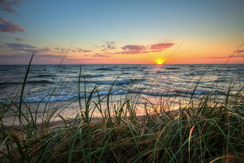 A beautiful sunset at Hoffmaster State Park overlooking Lake Michigan--Michigan State Parks.