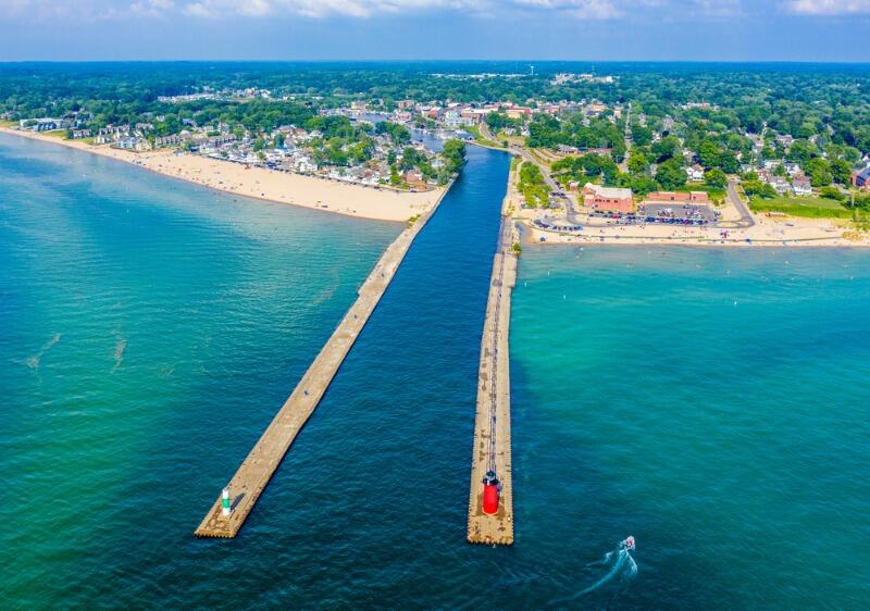 An aerial view of Grand Haven State Park, a Lake Michigan summer staple for locals and visitors.